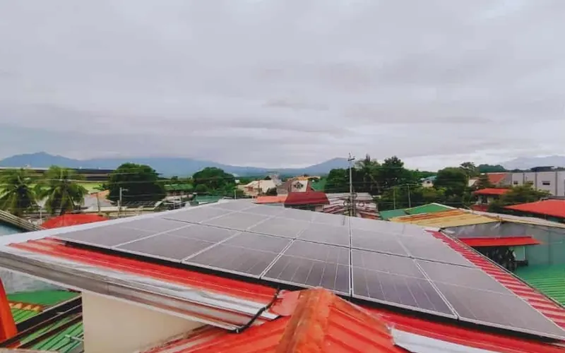 Solar panels on a red roof at the Brgy. Wakas Day Care Center in Orion
